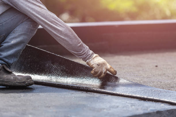Professional Basement Waterproofing technician working in Alpine, NJ
